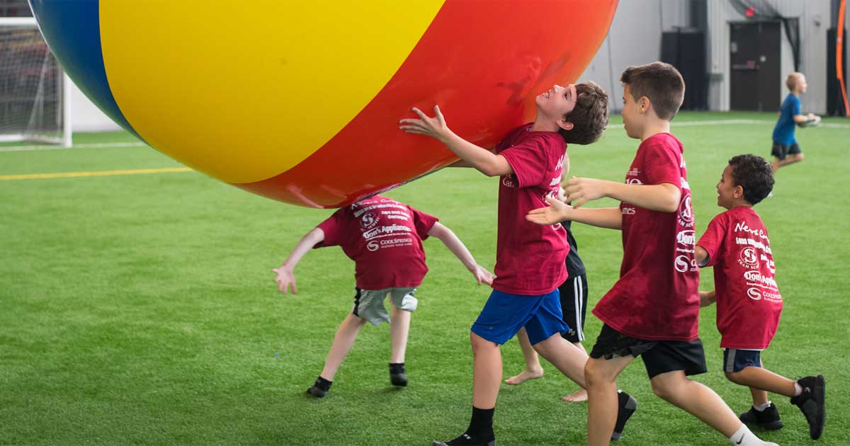 kids playing with big ball